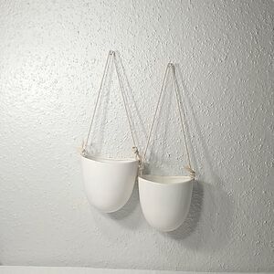 Set of 2 glossy Cream Ceramic Hanging Planter Pots with Jute strings.